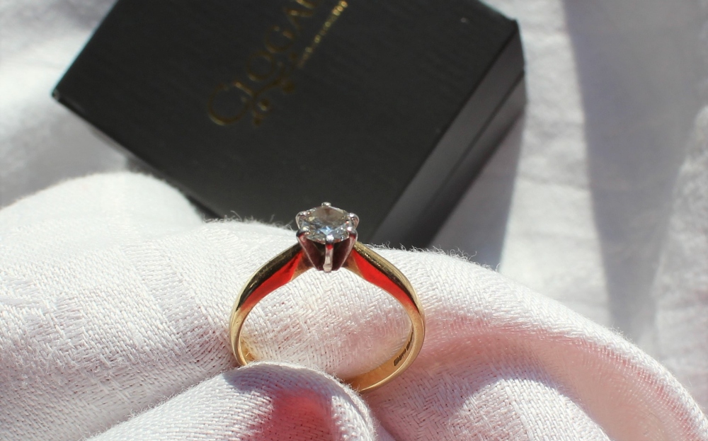 A solitaire diamond ring, the round brilliant cut diamond approximately 0. - Image 2 of 3