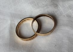 Two 9ct yellow gold textured wedding bands, approximately 3.