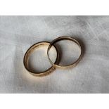 Two 9ct yellow gold textured wedding bands, approximately 3.