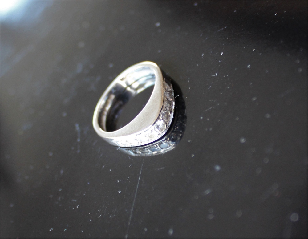 An 18ct white gold ring set with 9 round brilliant cut diamonds to a V shaped setting, - Image 3 of 4