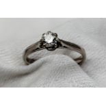 A solitaire diamond ring, the round old cut diamond approximately 0.