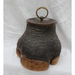 Taxidermy - Rowland Ward, a Rhino foot door stop, with a brass loop handle,