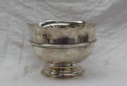 An Elizabeth II Irish silver bowl with a shaped rim and ring turned body on a spreading foot,