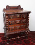 A 20th century rosewood topped chest,