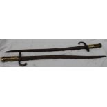 Two French Franco-Prussian War period Bayonets the saber-style bayonet with 57cm and 57.