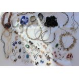 Assorted costume jewellery including earrings, bracelets, necklaces, pendants, faux pearls,