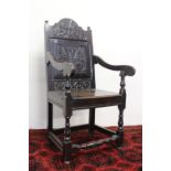 An 18th century oak wainscote elbow chair,