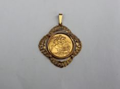 An Elizabeth II gold sovereign dated 1963 in a 9ct gold mount, approximately 10.