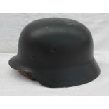 A German World War II helmet,