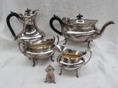 A George V silver four piece tea set, comprising a hot water pot, teapot,