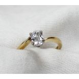 A solitaire diamond ring, the oval faceted diamond approximately 0.