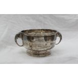 A George VI silver twin handled sugar basin, with elephant head handles and a spreading foot,