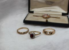 A garnet and paste set dress ring,