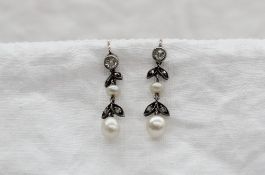 A pair of diamond and pearl drop earrings, the old cut diamond stud, approximately 0.
