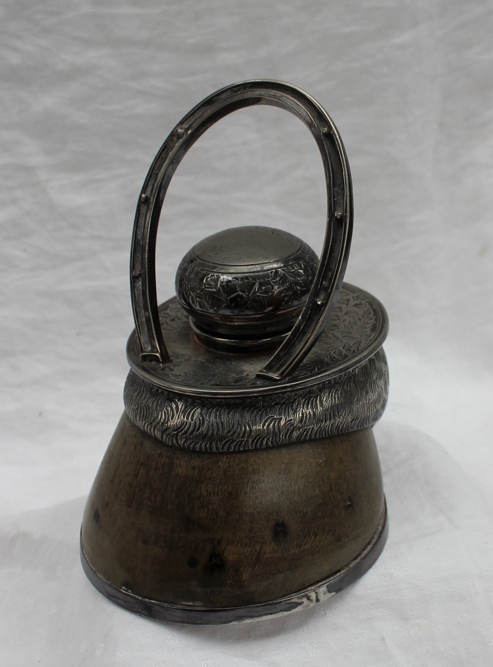 An electroplated horse hoof desk inkwell,