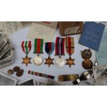 A set of five World War II medals including the 1939-1945 Star,