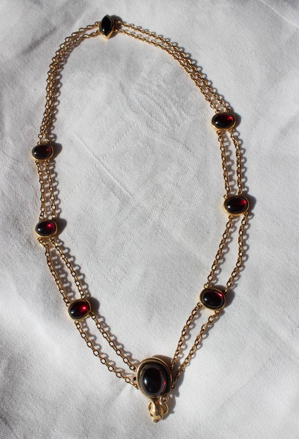 A yellow metal and garnet set necklace, - Image 4 of 5