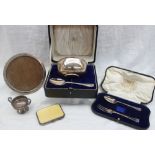 A George V silver christening set comprising a bowl and spoon.