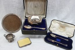 A George V silver christening set comprising a bowl and spoon.