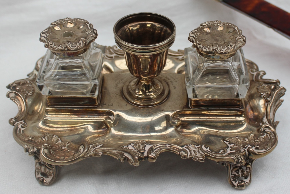 A late Victorian silver desk standish, with a central urn and two glass and silver topped inkwells, - Image 5 of 5