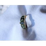 A sapphire, diamond and green enamel ring,