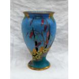 A Carltonware vase painted with bell flowers and other flowers to a mottled blue ground,