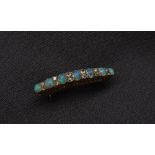 An opal and diamond bar brooch,