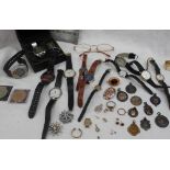 Assorted costume jewellery including wristwatches, brooches,