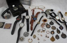 Assorted costume jewellery including wristwatches, brooches,
