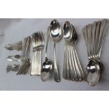A George V old English pattern silver part flatware service engraved with a “K” comprising twelve
