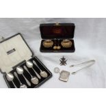 A pair of late Victorian silver shell salts, Birmingham, 1895 together with matching spoons, cased,