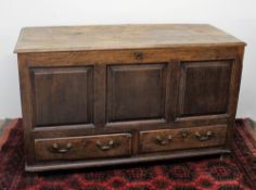 An 18th century oak coffer,