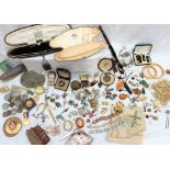 A quantity of costume jewellery including a pocket watch, cameo brooch, rings, faux pearls,