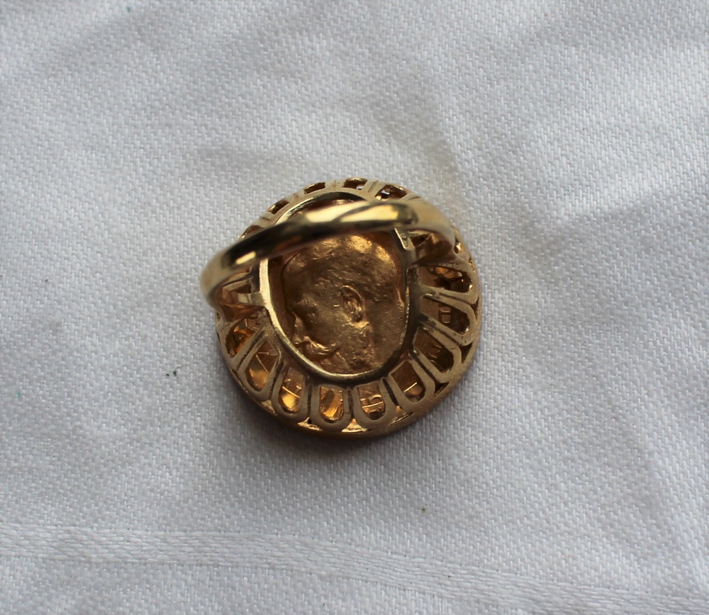 A George V gold sovereign set in a 9ct yellow gold ring setting and shank approximately 14. - Image 3 of 3