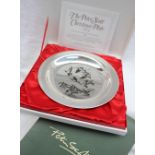 An Elizabeth II silver Peter Scott Christmas Plate 1974, decorated with Barnacle geese over Solway,