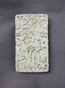 A Cantonese Ivory card case, carved with figures, pagodas and trees, 9.5 x 5.5 x 1.