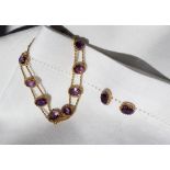 An amethyst and 9ct yellow gold bracelet set with nine oval faceted amethysts each approximately