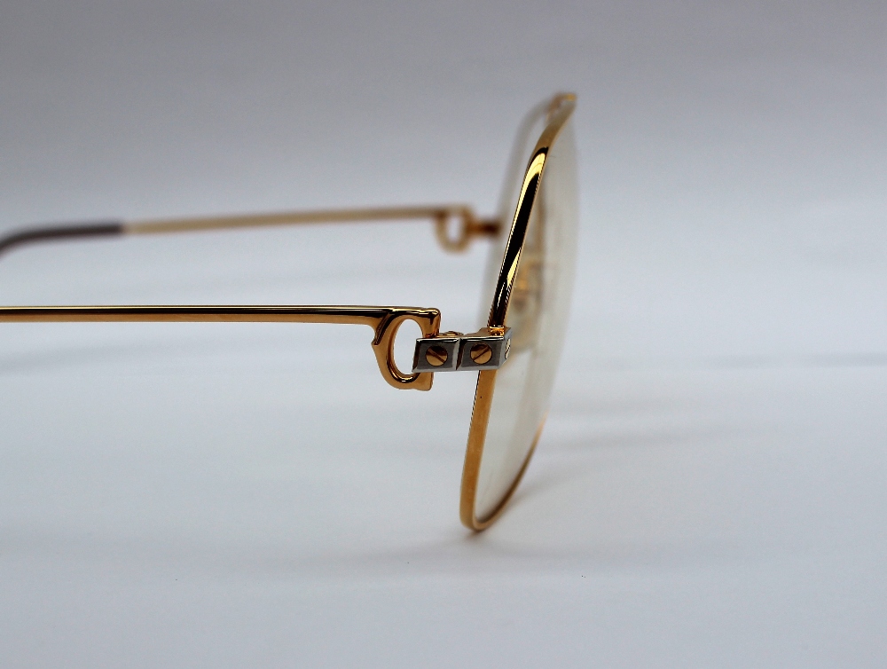 A pair of Must de Cartier Glasses with gilt rims, - Image 4 of 4