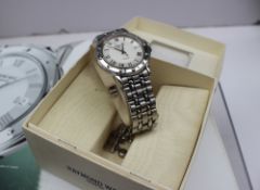A Raymond Weil mid size Tango wristwatch the white and silvered dial with Roman numerals and date