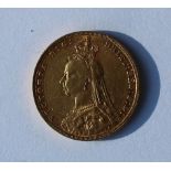 A late Victorian gold sovereign dated 1891,