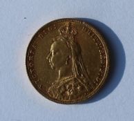 A late Victorian gold sovereign dated 1891,