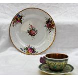 A Spode porcelain plate with a floral moulded border painted to the centre and edge with four