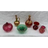 A ruby glass scent bottle with gilt jewelled decoration together with another scent bottle,