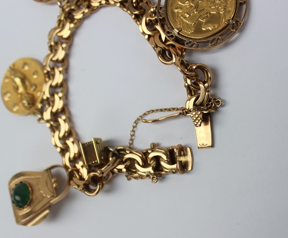 A Spanish yellow metal charm bracelet set numerous charms including a cottage, handbag, cupid, - Image 2 of 2