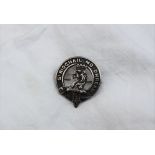 A George V silver Clan Gregor badge, with a lions head erased,