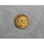 An Edward VII gold half sovereign,