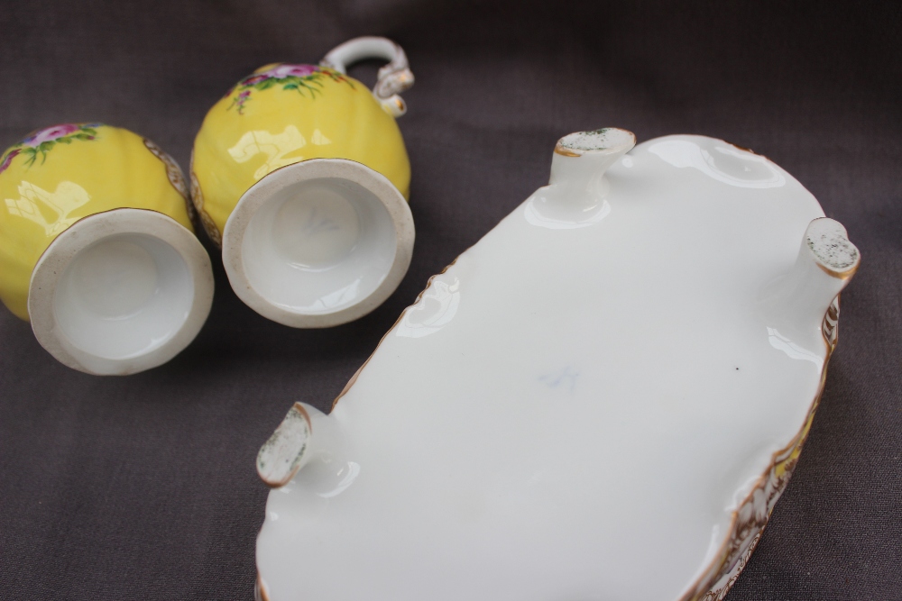 A 19th century continental porcelain oil and vinegar set in an oval stand, - Image 9 of 9