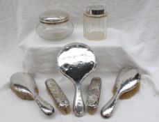 A George V Silver part dressing table set, comprising a hand mirror,