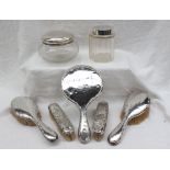 A George V Silver part dressing table set, comprising a hand mirror,