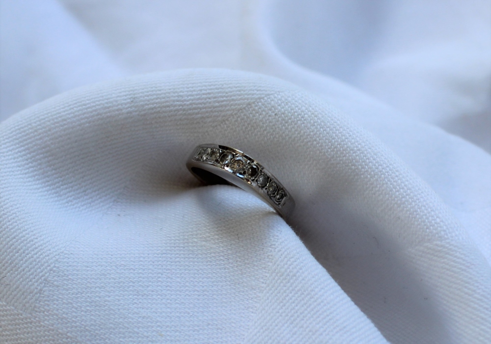An 18ct white gold ring set with 9 round brilliant cut diamonds to a V shaped setting, - Image 2 of 4